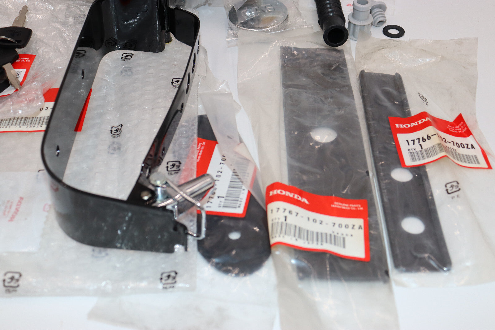 NEW Honda CT90 CT110 AUX. Tank COMPLETE WITH Mounting Strap, & FITTINGS.