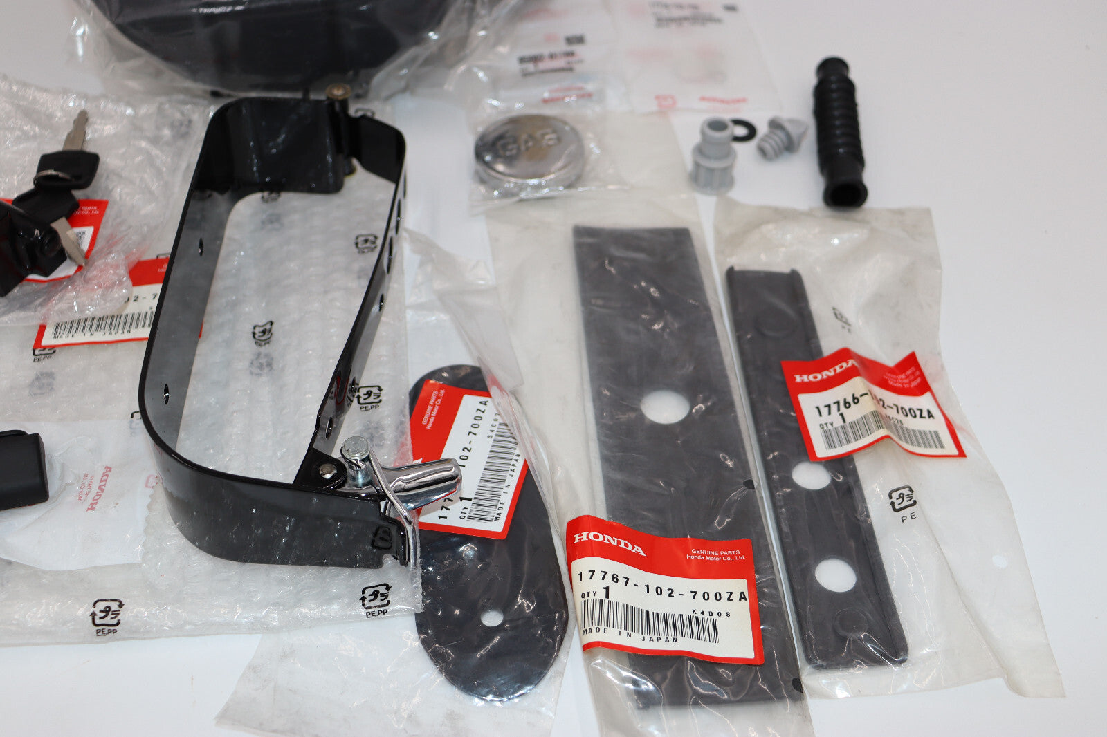 NEW Honda CT90 CT110 AUX. Tank COMPLETE WITH Mounting Strap, & FITTINGS.